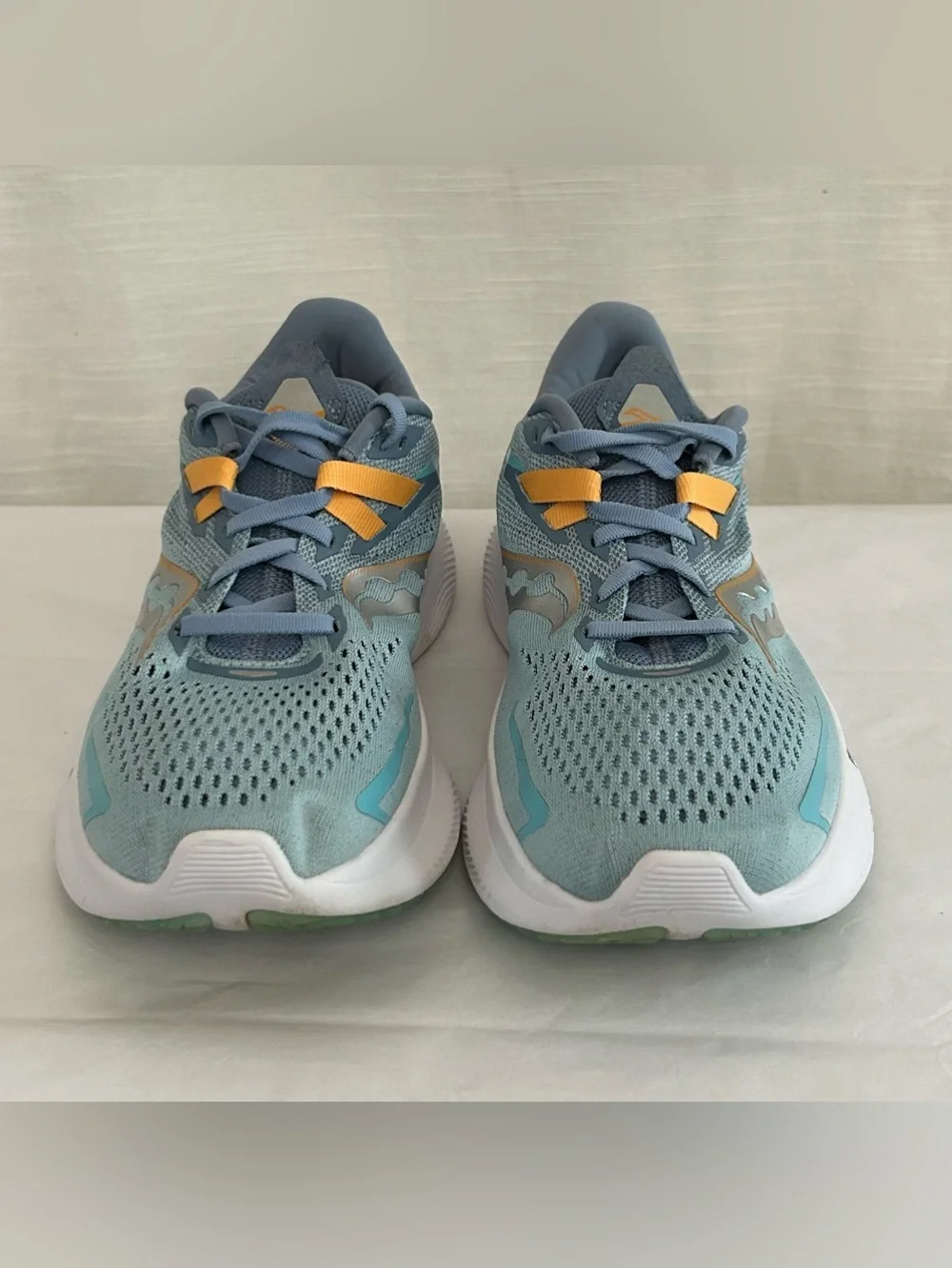 Saucony Ride 15 Women's Light Blue Athletic Sneakers with Yellow Accents